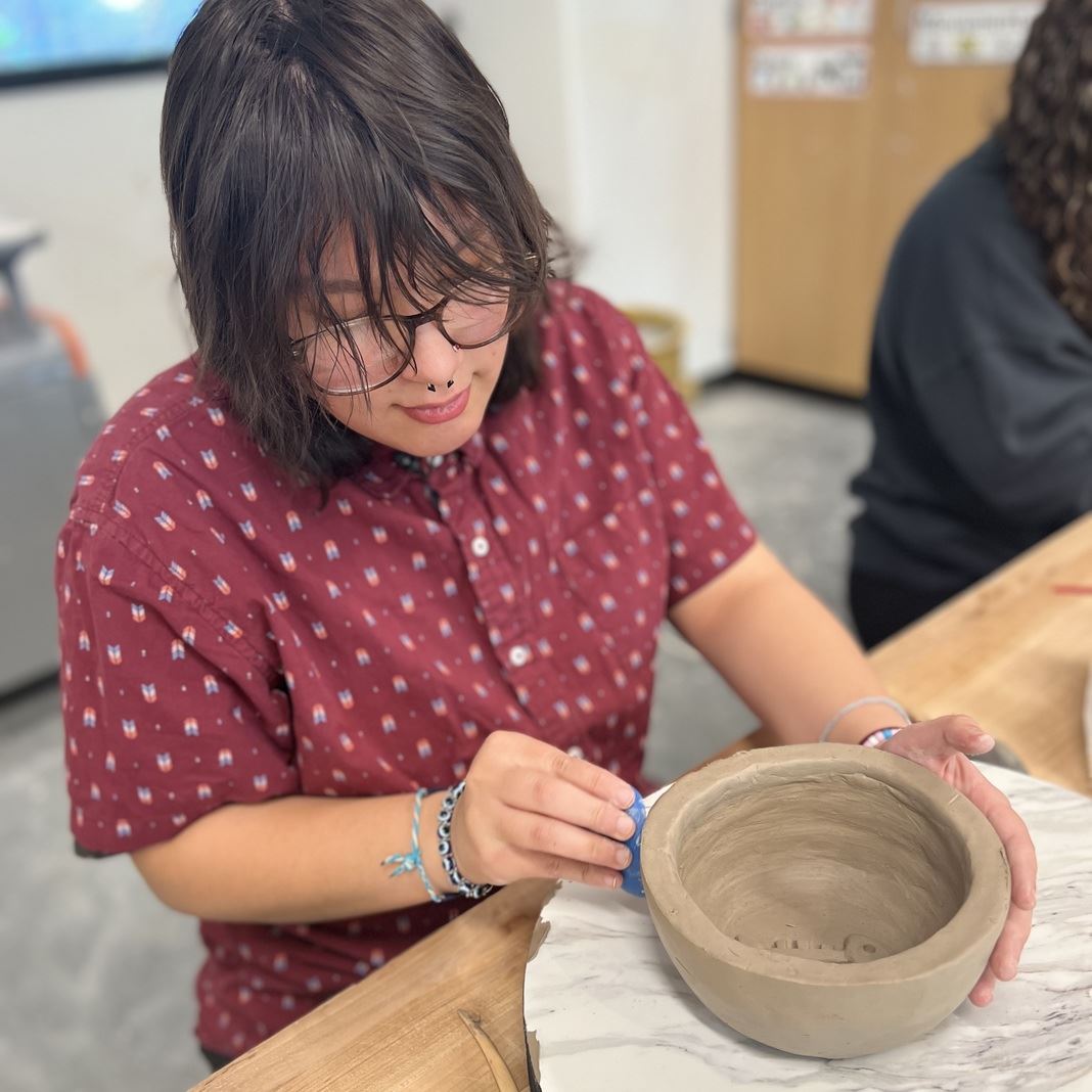  Jessie Boesiger works on her pottery